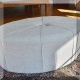 F41. Upholstered oval ottoman. 18”h x 48”w x 30”d 